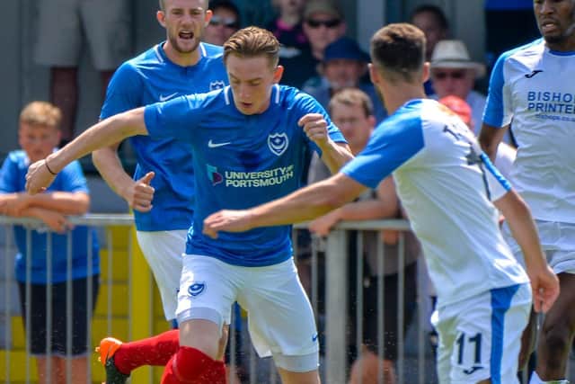 Ronan Curtis takes on the Hawks  Picture: Neil Marshall