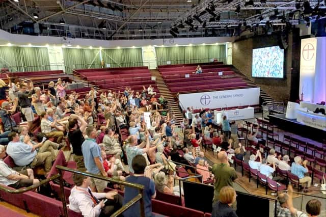 Bob White, on the extreme left in the blue striped shirt, watching England v Sweden at the General Synod in York last Saturday