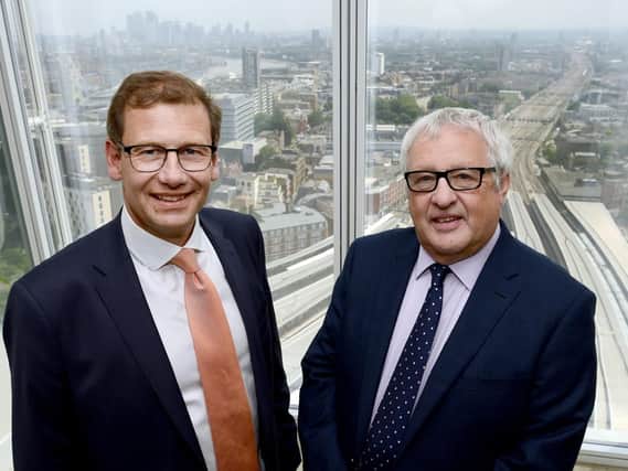 Baldwins, a business advisory group, has joined forces with accountants Wilkins Kennedy, in Fareham 
From left, William Payne (Wilkins Kennedy) and John Baldwin (Baldwins)