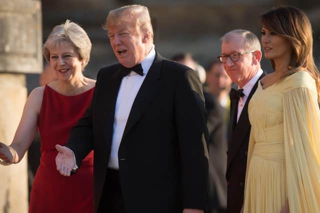 US President Donald Trump and his wife Melania are welcomed by Prime Minister Theresa May and her husband Philip May at Blenheim Palace, Oxfordshire. Picture: Stefan Rousseau/PA Wire