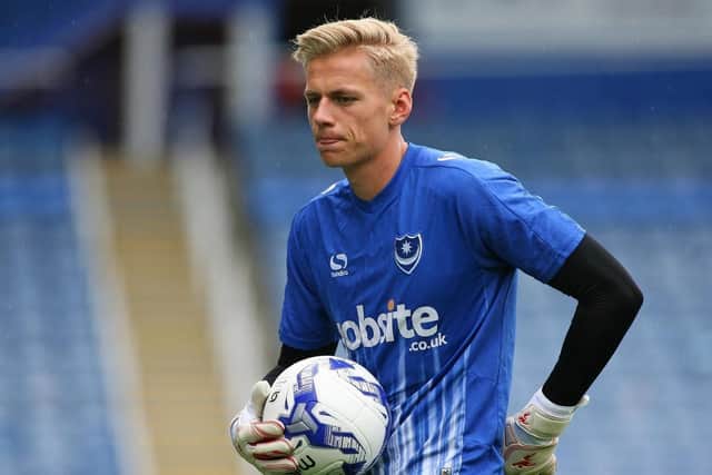 Pompey keeper Alex Bass is on loan at Torquay United.