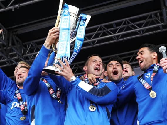 Pompey celebrate winning the League Two title in 2017. Picture: Joe Pepler