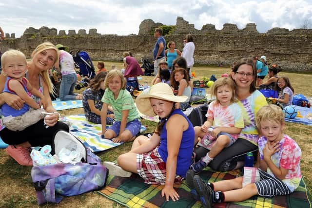 Bryony de Vries and Victoria Campbell with their children and some of their friends' children at Portchester Castle yesterday