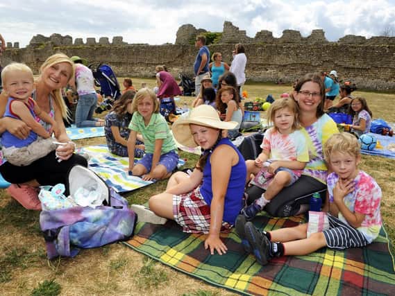 Bryony de Vries and Victoria Campbell with their children and some of their friends' children at Portchester Castle yesterday