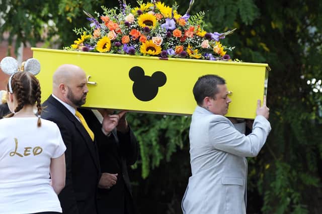 Leo being carried into St John's Church. Picture: Malcolm Wells