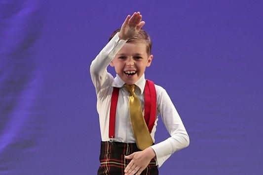 Marie Clarke School of Dance, in Southsea, had 19 members compete in the Dance World Cup in Barcelona. Picture is Max Ivemey (8) who won gold for his modern solo in the mini boys modern solo section. Picture: Club Wow