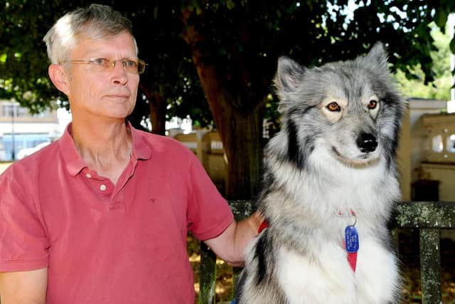 Veteran Terry Beale from Southsea, with his assistance dog Bella, a three-year-old Euraiser
Picture: Sarah Standing (180547-8772)