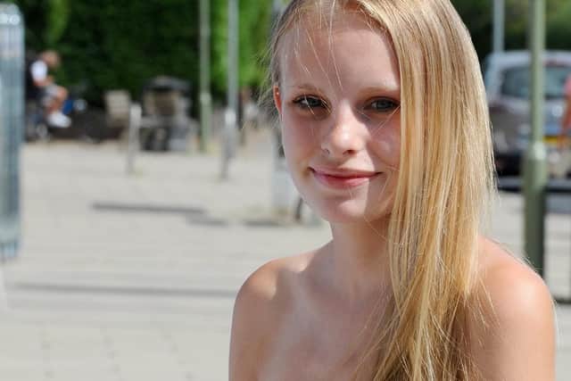 Georgia Brickell, 16, before she had her hair shaved off at Jenuine Styles in Waterlooville. Picture: Sarah Standing