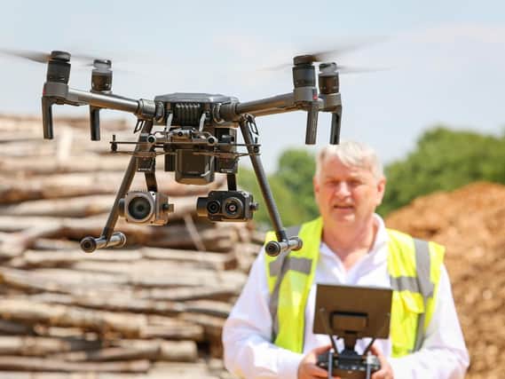 Ray Faulkner, MD of iRed, in Emsworth, with one of the firm's drones