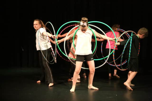 Hula Hoop Globe Fit troupe perform in their first show. Picture: William Evenden/iWill Photo Photography
