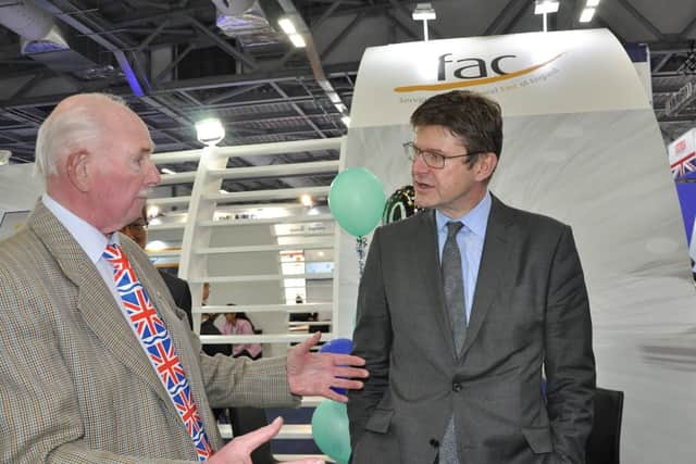 Tony Barnett from Barnbrook Systems and a director of Farnborough Aerospace (FAC) speaks to Government Minister Greg Clark
