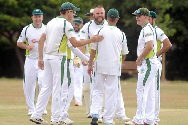 Emsworth celebrate one of Rob Norris' wickets. Picture: Kate Shemilt (180345-2)