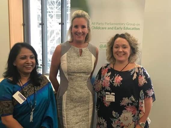 From left, chief executive of the National Day Nurseries Association Purnima Tanuku OBE, Gosport MP Caroline Dinenage, and head of Rowner Family Centre Nicole Atkinson. Picture: Supplied