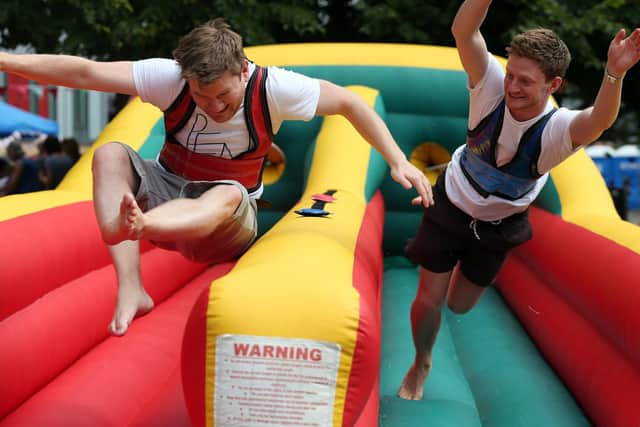 The Gibson brothers, Luke, left, and George, on the bungee run. Picture: Chris Moorhouse