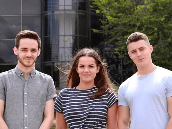 Carl Hewitt and Reece Matthews, founders and directors of Digital Dinos, a digital marketing agency based at Lakeside, Portsmouth, with their new recruit apprentice Jess Moon