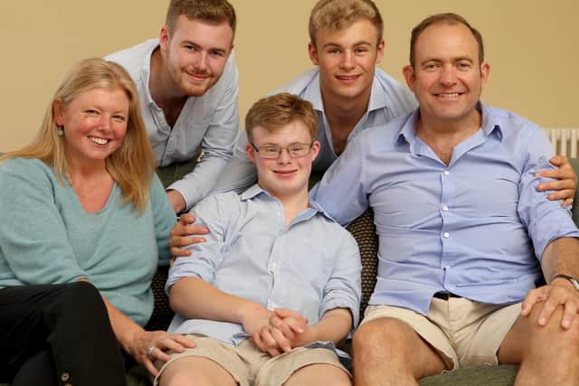 Rachael Ross with her sons, Jack 20, Max 13, Tom 18, and her husband, Ken. Rachael is the founder of Portsmouth Down Syndrome Association. She has received the Portsmouth Civic Award for her charity work