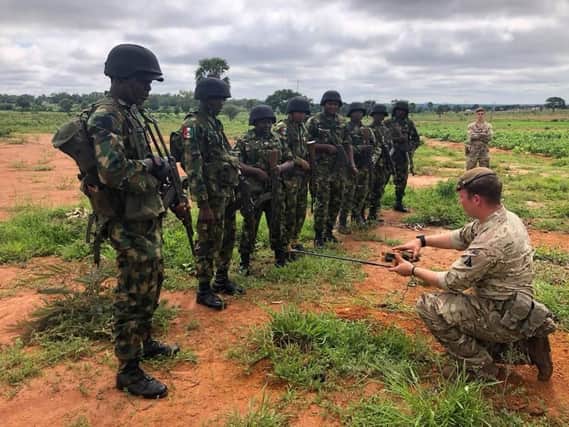 A member of 2PWRR teaching Nigerian soldiers about how to deal with an improvised explosive device (IED). Photo: 2PWRR