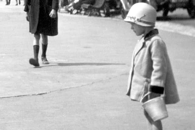 The little girl looking for sand.
