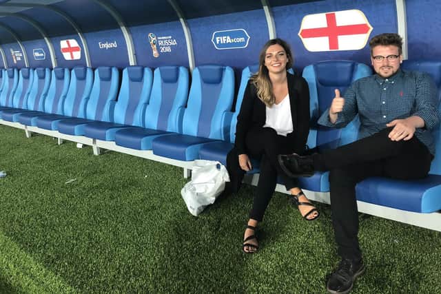 Lloyd Ashton with Watford pitch-side presenter Emma Saunders in the England dugout at the Kaliningrad Stadium