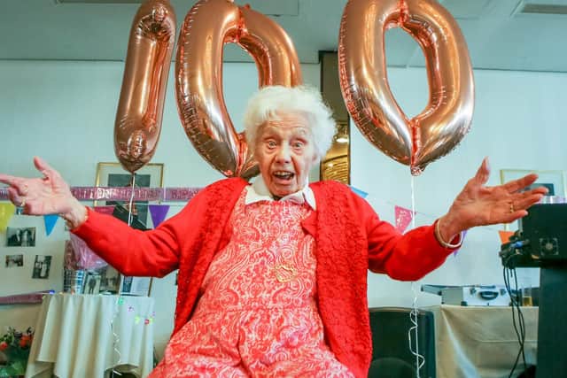 100-year-old Marge Dunaway celebrates her birthday at the Royal Beach Hotel surrounded by family and friends