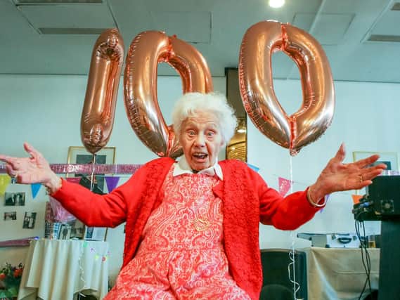 100-year-old Marge Dunaway celebrates her birthday at the Royal Beach Hotel surrounded by family and friends