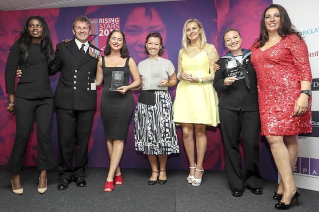 Leading Writer Rebecca Fyans, second from right, receiving her award LPhot Sam Seeley/Royal Navy