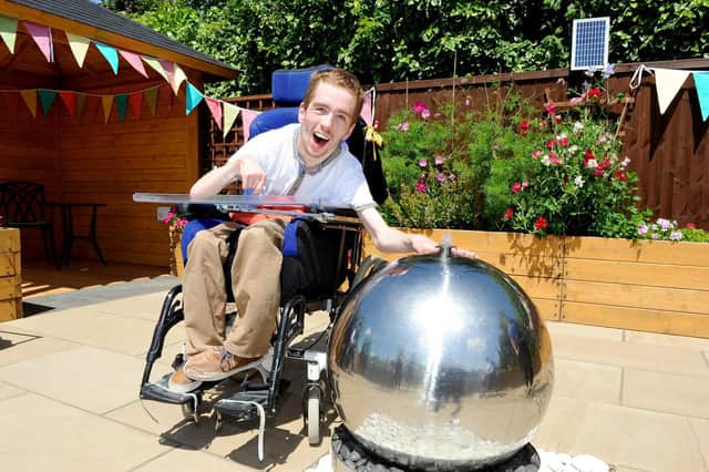 Rhys Pike (23) from Portsmouth in the new sensory garden. Picture: Sarah Standing