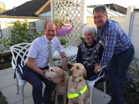 From left, Tom McInulty, dogs Brunel and Toby, Betty Richards and Alan Titchmarsh. Picture: Macular Society