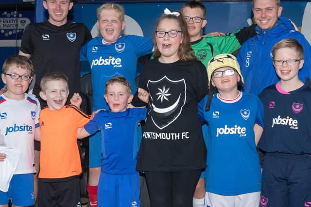 Back row far left & right, Luke Prior and Zach Messenbird with their students at the Pompey in the Community event.

Picture: Keith Woodland