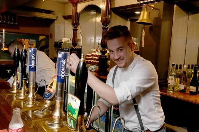 Sean Barnes pouring a pint in Eldon Arms. Picture: Habibur Rahman