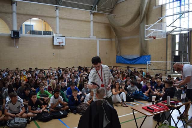 Finlay George and Dylan Hibberd receive their haircuts