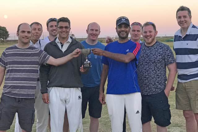 VICTORY: Members of Portsmouth Property Association relish victory over Southampton Property Association in the annual cricket fixture, held at St Helens Fields, Southsea.