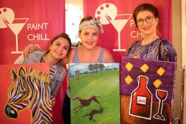 Guests at Paint Chill Co show off their artwork