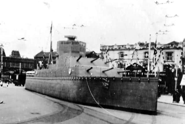To celebrate the coronation of George VI in 1937 a model warship was placed in Guildhall Square, Portsmouth. Picture: Ellis Norrell Collection