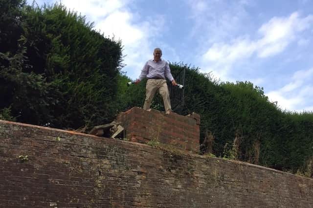 Simon Bladon of Jenkyn Place Vineyard inspects the damage. Picture: Solent News & Photo Agency