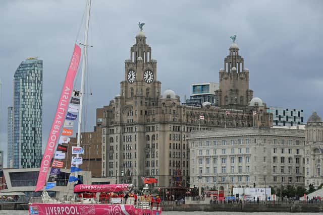 The Liverpool 2018 team arrives at the finish line after a "sprint finish" to conclude the Clipper 2017-2018 Round the World Yacht Race outside the Royal Albert Dock in Liverpool. Picture: Peter Byrne/PA Wire