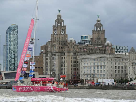The Liverpool 2018 team arrives at the finish line after a "sprint finish" to conclude the Clipper 2017-2018 Round the World Yacht Race outside the Royal Albert Dock in Liverpool. Picture: Peter Byrne/PA Wire