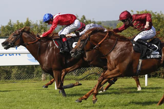 Lightning Spear, right, and Oisin Murphy win at Goodwood. Picture: PA