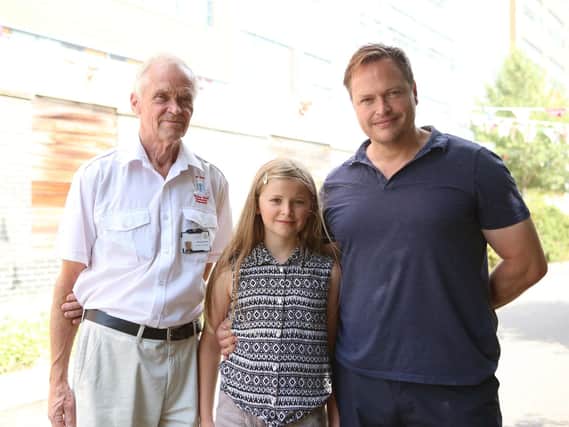 Mark Coates' daughter Livvy, aged eight, received hospital treatment after having a brain haemorrhage. He is full of praise for the QA team and wants to highlight their good work. The are pictured with grandad Richard