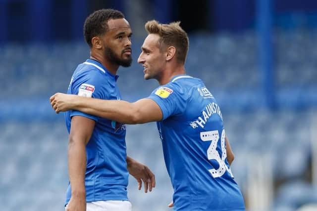 Brandon Haunstrup congratulates Anton Walkes on his Utrecht strike.  Picture: Ben Queenborough