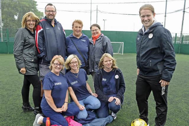 Gemma Morrison, far-right, with helpers from left Jan Neal and Steve Neal, Sally Sines and Sarah Balchin from QA, front Liz Jones, Mandy Baker and Kari Pratt. Picture: Ian Hargreaves
