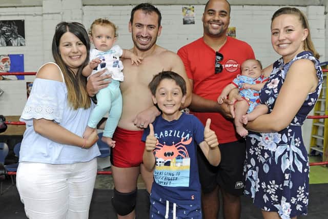 Andy Simmonz who runs the Portsmouth Wrestling School. (l to r), Lyndsey Simmonz, Polly Simmonz, Andy Simmonz, Finley Watkins (eight), Andy Quildan, Calvin Quildan, and Hayley Quildan.