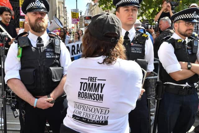 Supporters of Tommy Robinson outside the Royal Courts of Justice in London, where the  former English Defence League (EDL) leader has been freed on bail by the Court of Appeal after winning a challenge against a finding of contempt of court. Picture: John Stillwell/PA Wire