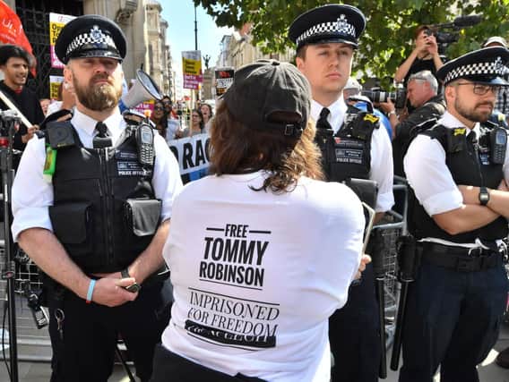 Supporters of Tommy Robinson outside the Royal Courts of Justice in London, where the  former English Defence League (EDL) leader has been freed on bail by the Court of Appeal after winning a challenge against a finding of contempt of court. Picture: John Stillwell/PA Wire