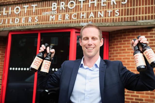 Tom Elliott, Managing Director of Elliotts, with the Elliotts 175 Pale Ale outside Elliotts head office