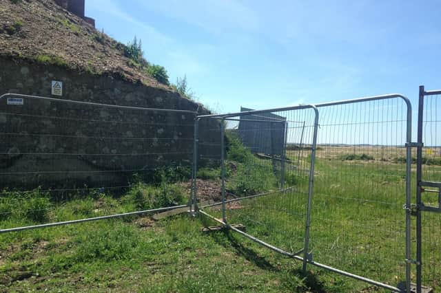 The fencing around Fort Gilkicker has frustrated residents for months. Picture: Steve Bone