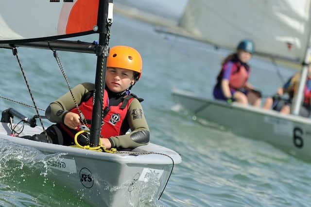 Students learning to sail