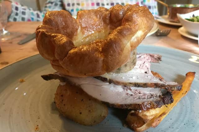 Roast lamb crowned with Yorkshire pudding.