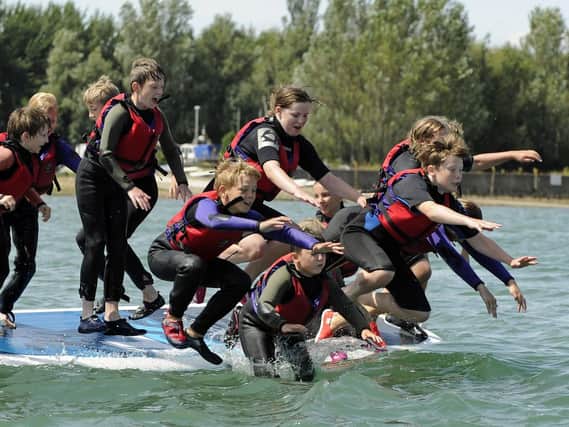 Children take part in holiday sailing activities at the Andrew Simpson Watersports Centre in Portsmouth. Picture: Ian Hargreaves
