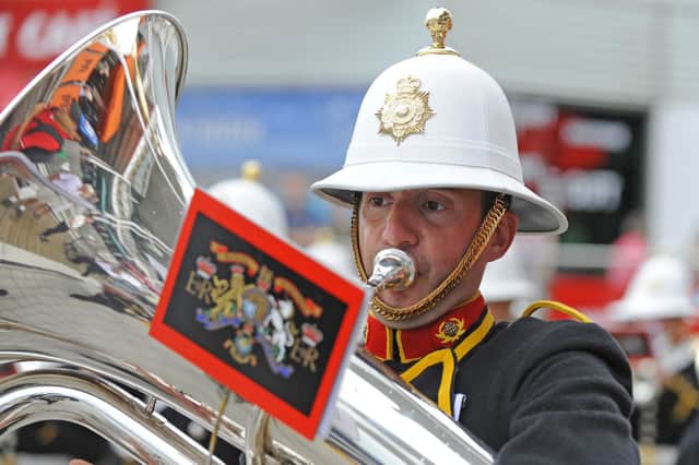 A Royal Marine performing.